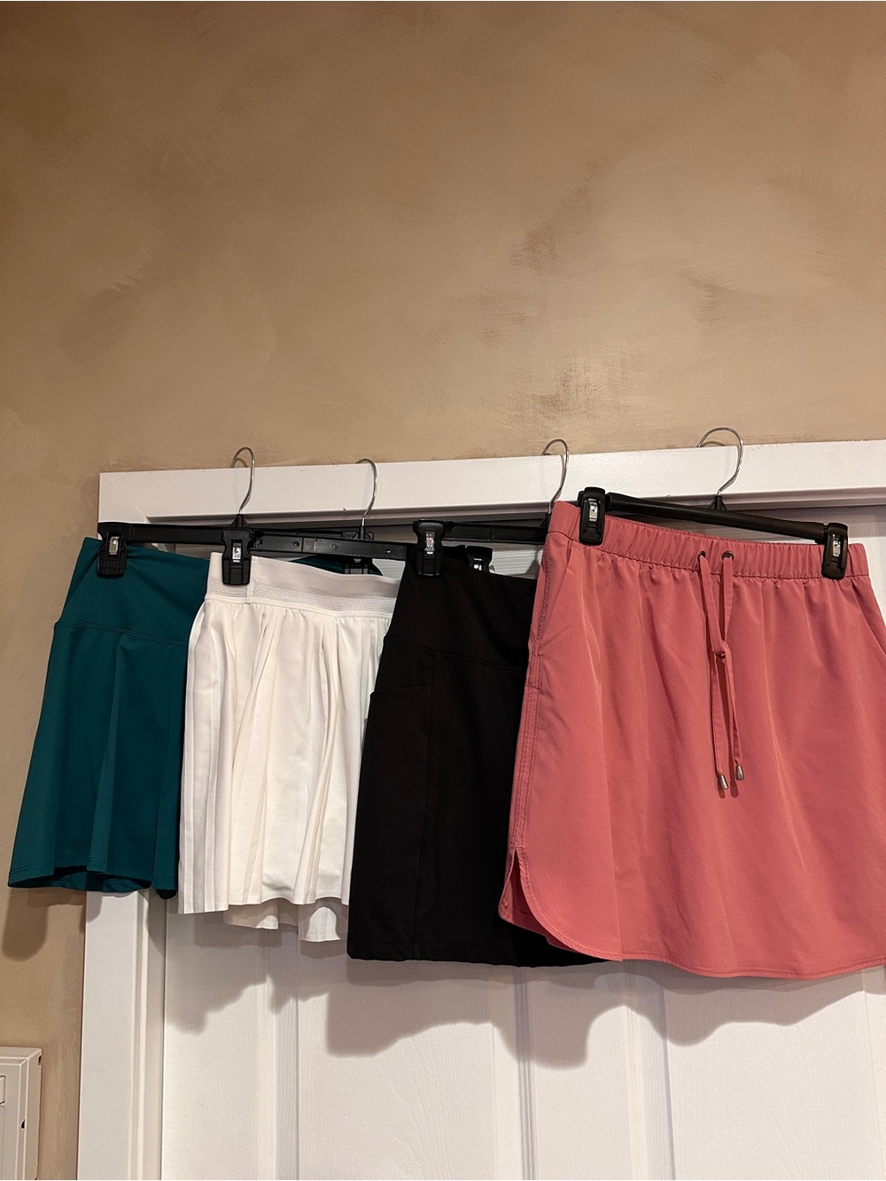 Four Athletic Skorts in Teal, White, Black & Dusty Rose